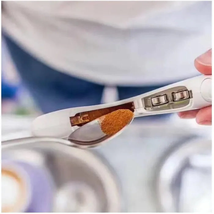 Close-up of latte art pen internal mechanism with brown powder