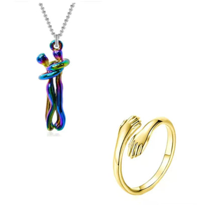 Colorful couple hug pendant necklace and golden hands wrap ring, offering a vibrant modern jewelry set.