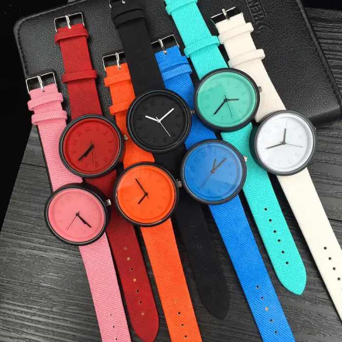 Colorful modern wristwatch collection with minimalist designs and vibrant straps for stylish accessories.