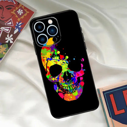 Colorful splatter skull phone case with vibrant paint effects, ideal for a creative and bold look.