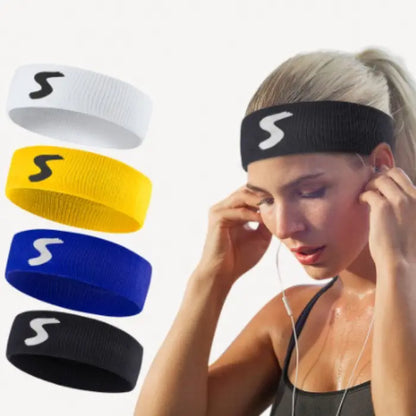 Multi-colored sweatbands and a woman wearing a black sports headband for fitness and workout sessions.