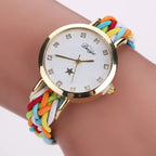 Women's watch with a gold case, white dial, and colorful braided rope band.