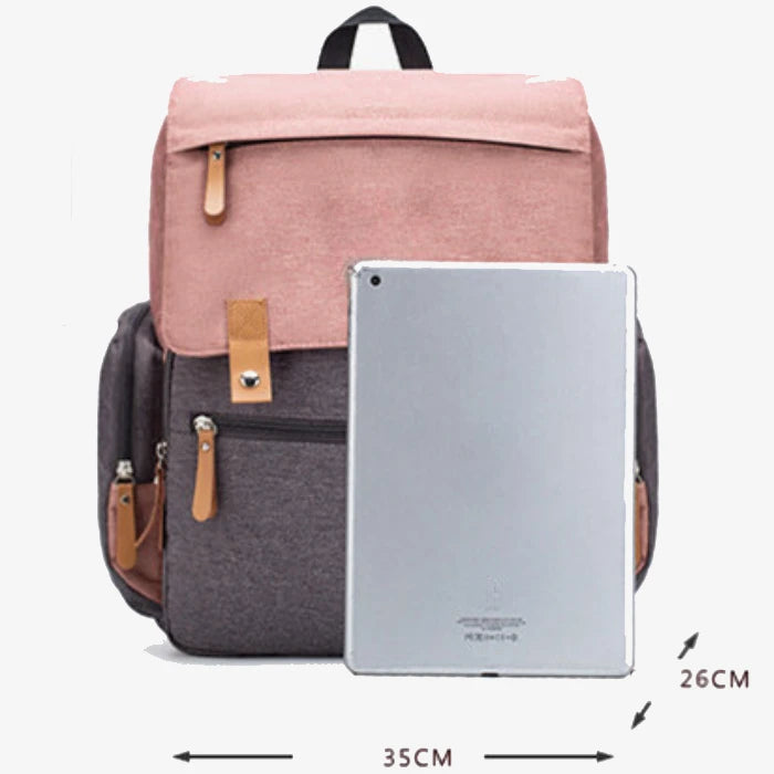 Stylish diaper backpack dimensions 39x35x26cm shown with iPad for size reference, perfect for daily parenting essentials