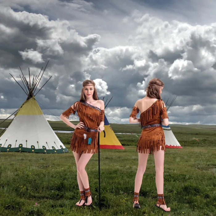 Complete one shoulder fringe costume set shown from front and back with teepees in background.