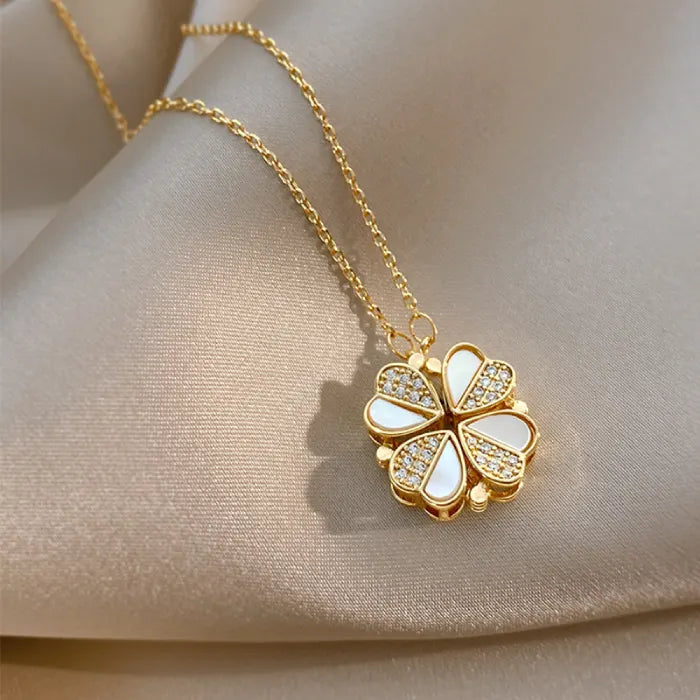 Convertible Heart Necklace in gold featuring clover pendant with crystal heart accents