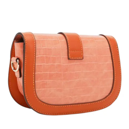 Side view of coral saddle bag showing croc-textured leather and curved silhouette with contrast orange trim