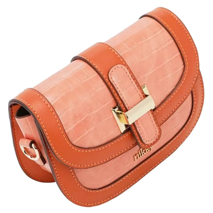 Angled front view of coral crossbody showing layered flap design and gold hardware closure