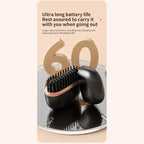 cordless straightener long battery life shown, open compact case with travel brush on reflective surface under soft glow