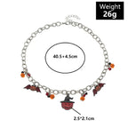 Halloween-themed necklace with pumpkin and bat charms, size and weight labeled.