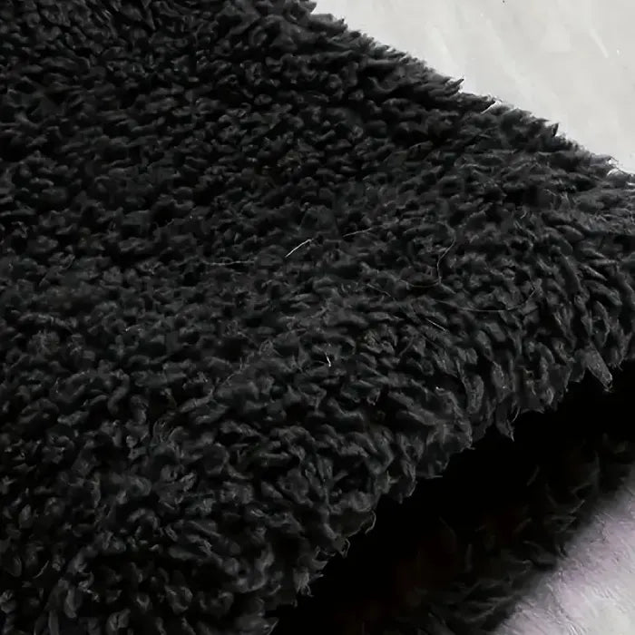 Cozy Sherpa Hooded Cardigan black sherpa fabric close up showing thick fleece texture for superior warmth and comfort
