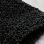 Cozy Sherpa Hooded Cardigan black sherpa fabric close up showing thick fleece texture for superior warmth and comfort