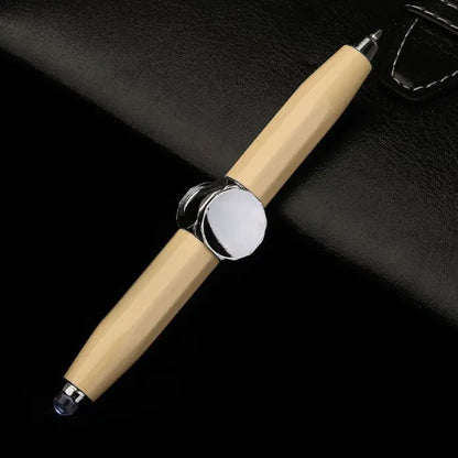 Beige fidget spinner pen and stylus combination displayed on a dark background.