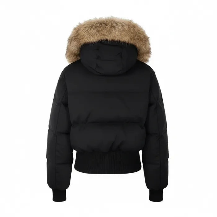 Cropped bomber jacket with fur hood in black shown from back, padded winter bomber design built for warmth and comfort