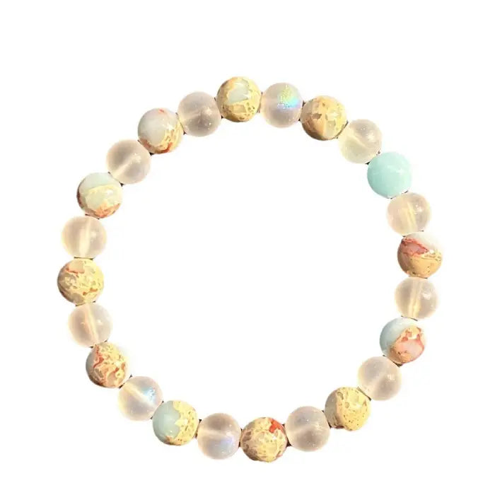 Crystal healing bracelet with frosted and jasper beads shown in sunlight, offering calming energy and clarity for daily balance