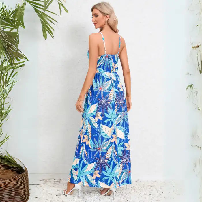 Cute summer dress with blue and brown floral print on white background, featuring v-neck wrap design and maxi length