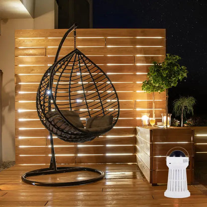 outdoor mosquito zapper lamp placed on a patio, eco-friendly and chemical-free, enhancing evening relaxation with its soft light.