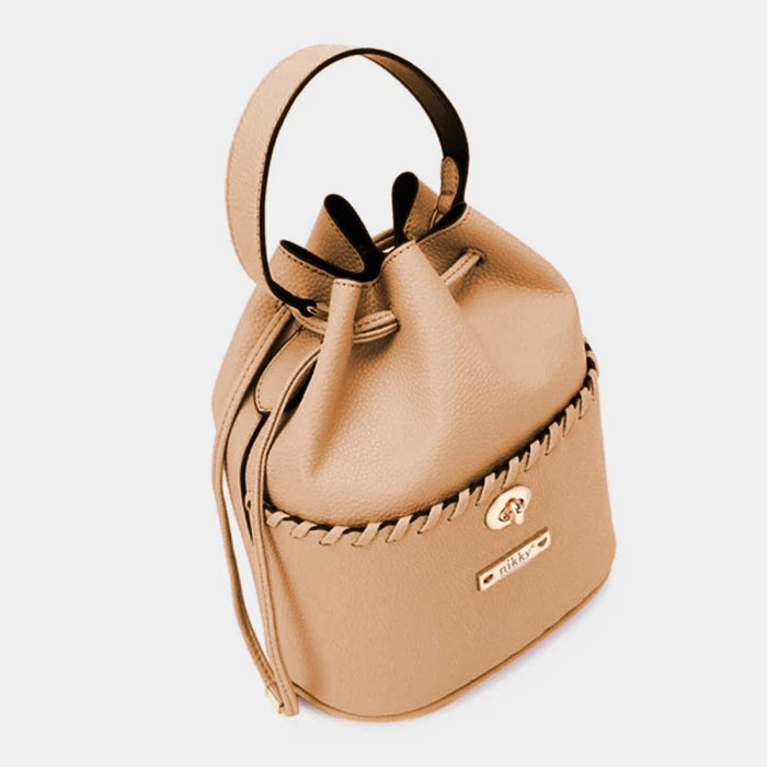 Angled view of designer bucket bag highlighting braided leather accent and gold turn-lock closure