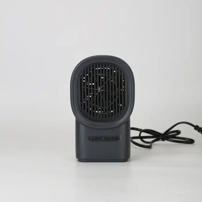 Desktop electric heater front-facing view showing compact size and black grille design.