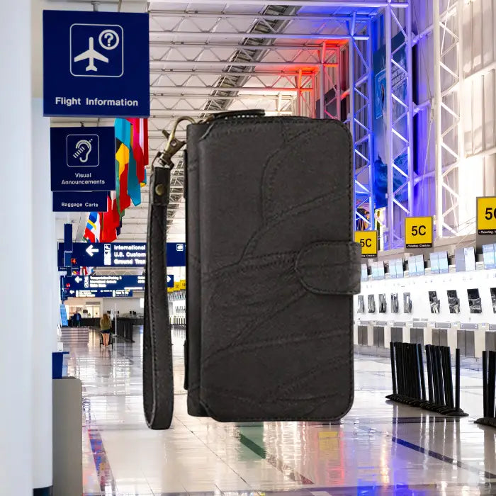 Detachable magnetic iPhone wallet providing essential travel convenience at airport with quick access to boarding pass and ID