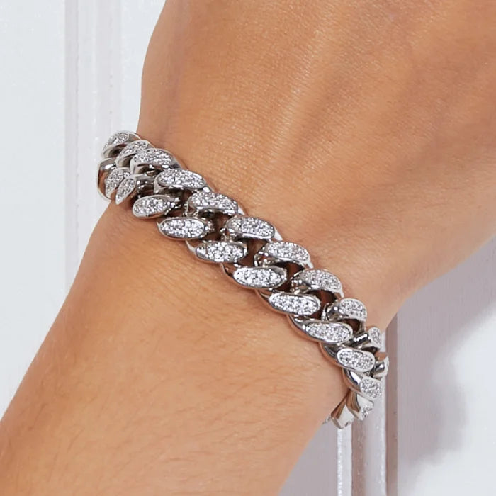 Luxury pave diamond Cuban chain bracelet showcased on wrist with brilliant stones and sophisticated silver finish design