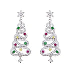 Sparkling Christmas tree earrings with diamonds and colorful gemstones for festive jewelry inspiration.
