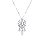 Silver dreamcatcher pendant necklace with luminous gemstone and dangling crystal charms on white background.