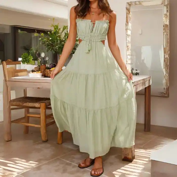  Dress in pale green with drawstring bust, full tiered skirt and gentle romantic styling