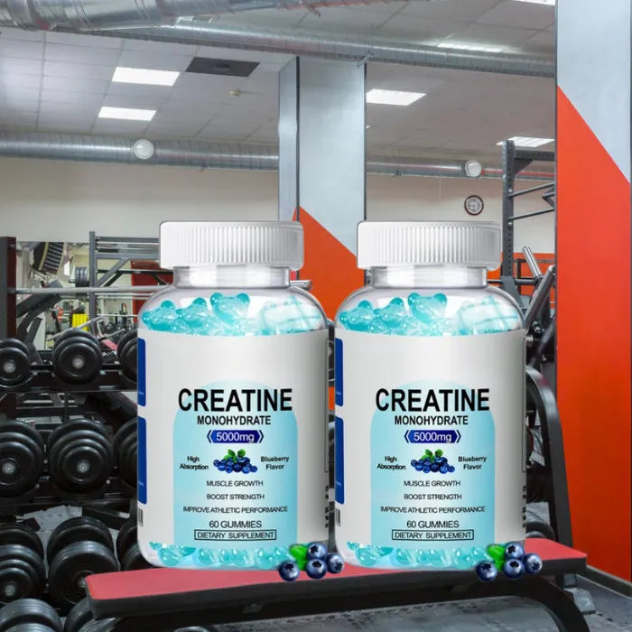 Two bottles of blue creatine gummies displayed on gym bench, focus on fitness enhancement.