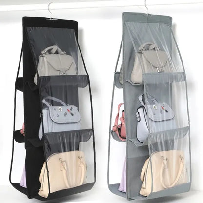 Black and gray hanging organizers with purses.