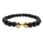 dumbbell bracelet with gold dumbbell charm and shiny black onyx beads