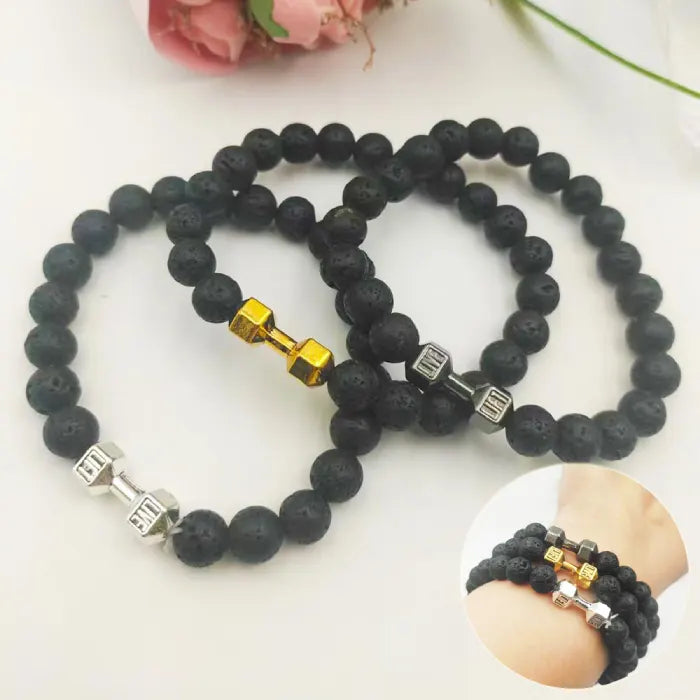 dumbbell bracelet set with three color dumbbell charms and inset wrist photo