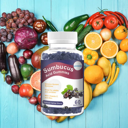 Sumbucus Acid Gummies bottle with elderberry, Vitamin C, and Zinc in front of a heart-shaped fruit display.