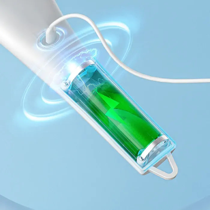 Transparent capsule with green liquid inside electric facial brush, surrounded by blue energy visualization