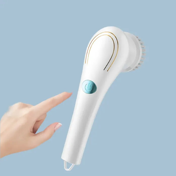 Close-up of white facial cleansing brush showing turquoise power button and gold accent lines