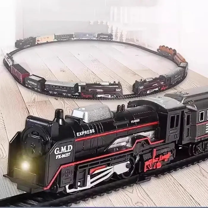 Electric toy train set on a circular track, featuring a black locomotive with glowing headlights.