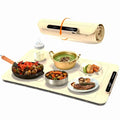 Electric warming tray showcasing rolled storage feature, with various dishes including seafood and soup.