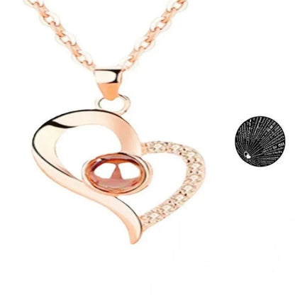 Elegant rose gold heart necklace saying "I Love You" in 100 languages.