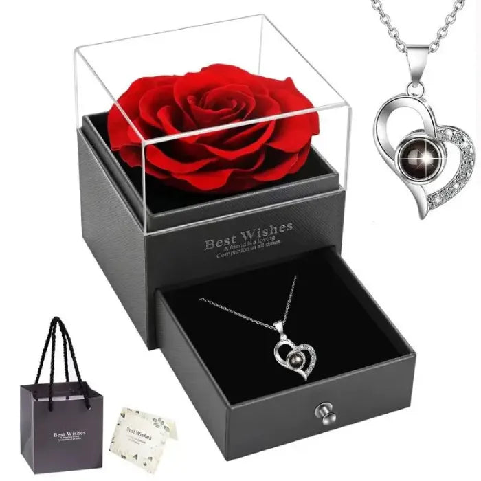 Silver heart necklace with rose in a gift box, perfect romantic present.