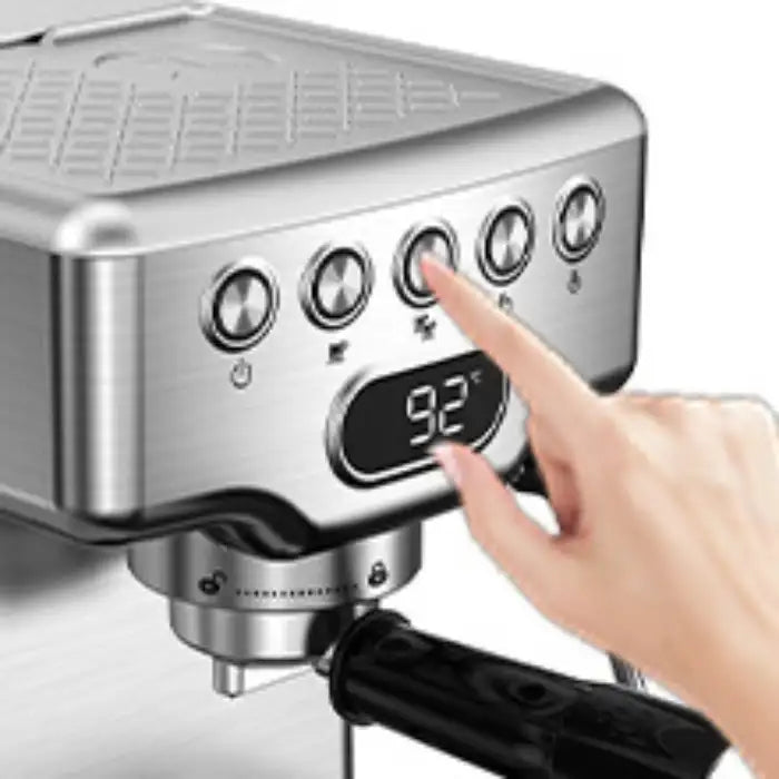 Expresso Machine in use with a finger pressing the simple one-touch brew button