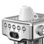 Expresso Machine featuring top cup warming rack with white ceramic espresso cup placed