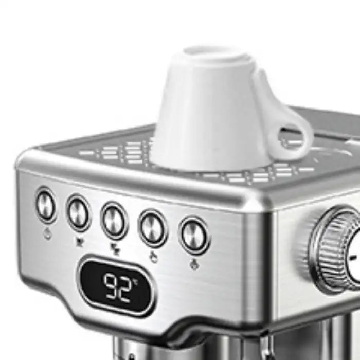 Expresso Machine featuring top cup warming rack with white ceramic espresso cup placed