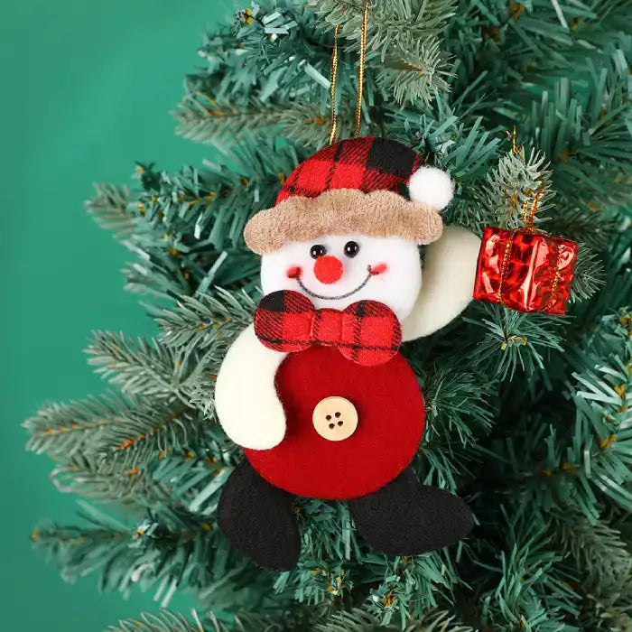 fabric pendant santa claus snowman ornament hanging on christmas tree with red gift box