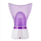 Front view of a purple facial steamer with wide steam mask and white base.