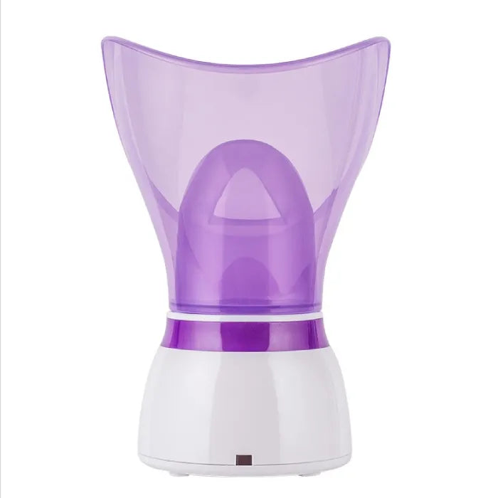 Front view of a purple facial steamer with wide steam mask and white base.