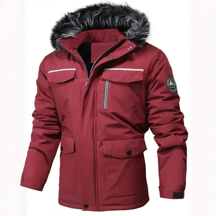  Faux fur hooded winter parka jacket in burgundy, with cargo pockets and reflective trim, shown from the front.