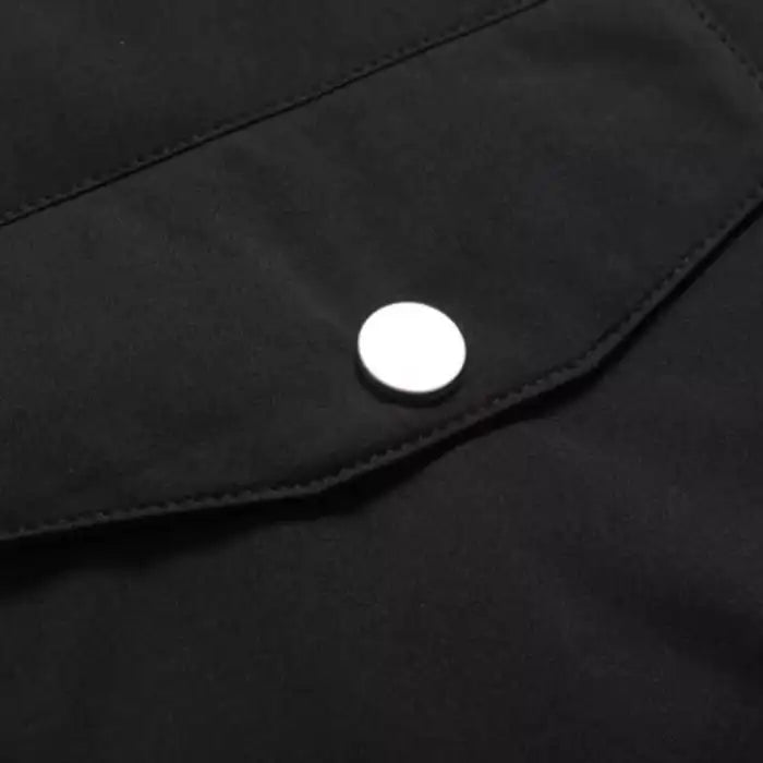 Faux fur hooded winter parka jacket lower pocket, with silver snap button closure for secure storage.