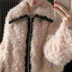 Faux fur jacket in soft blush with zip front and plush texture, styled for winter warmth and chic everyday outfits