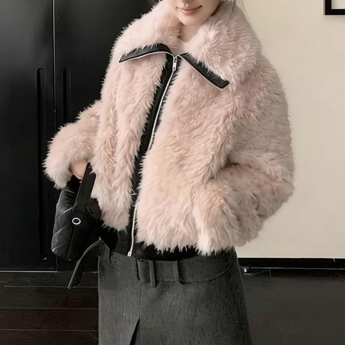 Faux fur jacket in soft blush with plush texture, zippered front and cozy fit, styled for elegant winter outfits