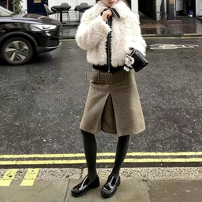 Faux fur jacket in soft blush with zip front and plush texture, styled for winter warmth and chic everyday outfits