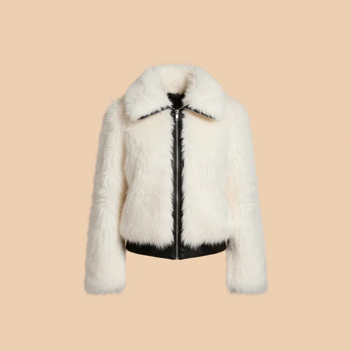 Faux fur jacket in soft blush with zip front and plush texture, styled for winter warmth and chic everyday outfits